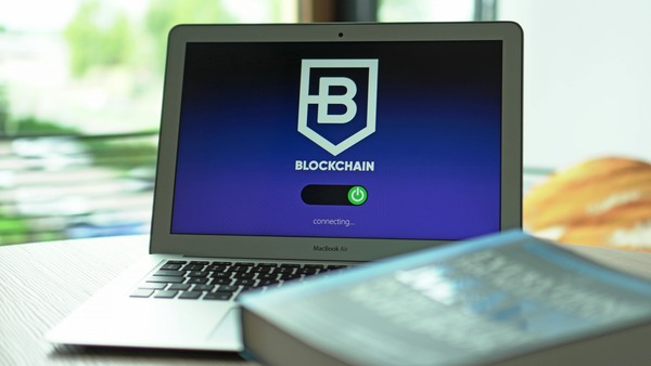 Laptop displaying a blockchain wallet login screen